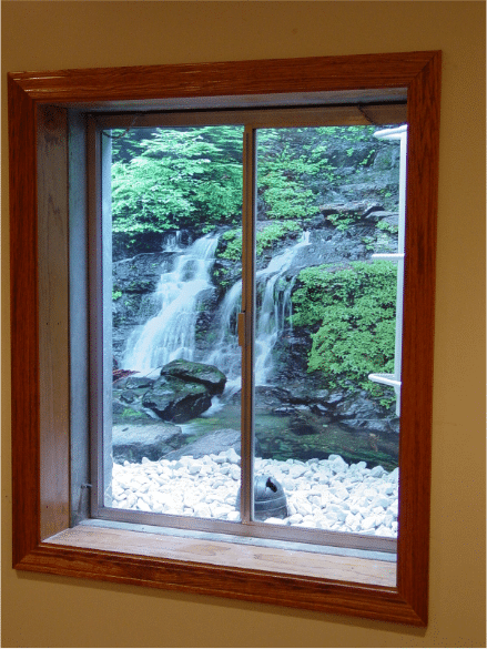 decorative window well liner with waterfall theme