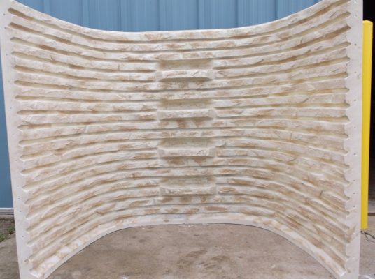 stacked stone basement well in sandstone color